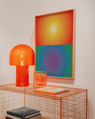 A framed poster with an abstract prideflag in two separate blocks, retro style.