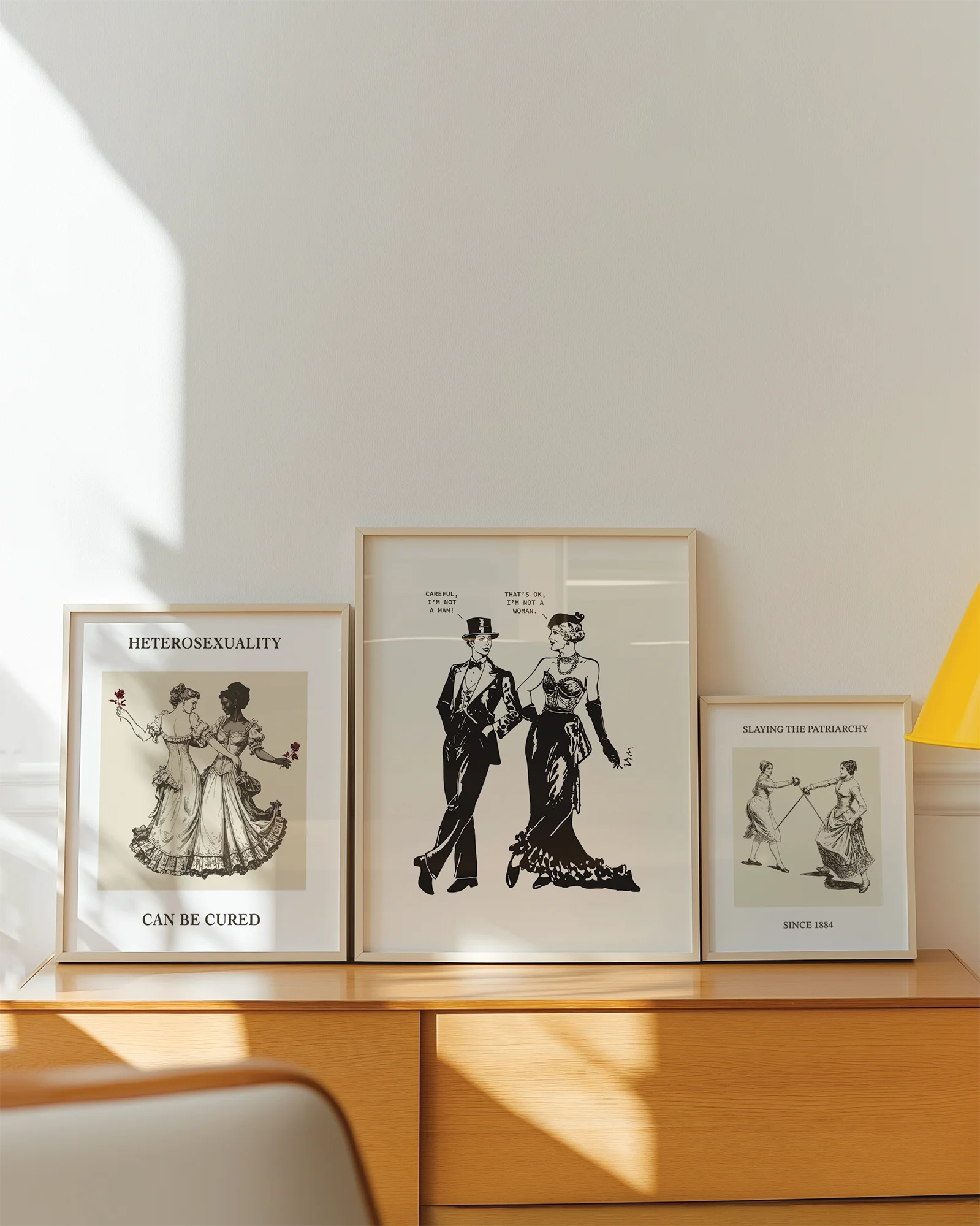 A poster featuring two androgynous characters: a woman dressed in a suit and a man in a dress, exchanging lines:
“Careful, I’m not a man.” “That’s ok, I’m not a woman.”