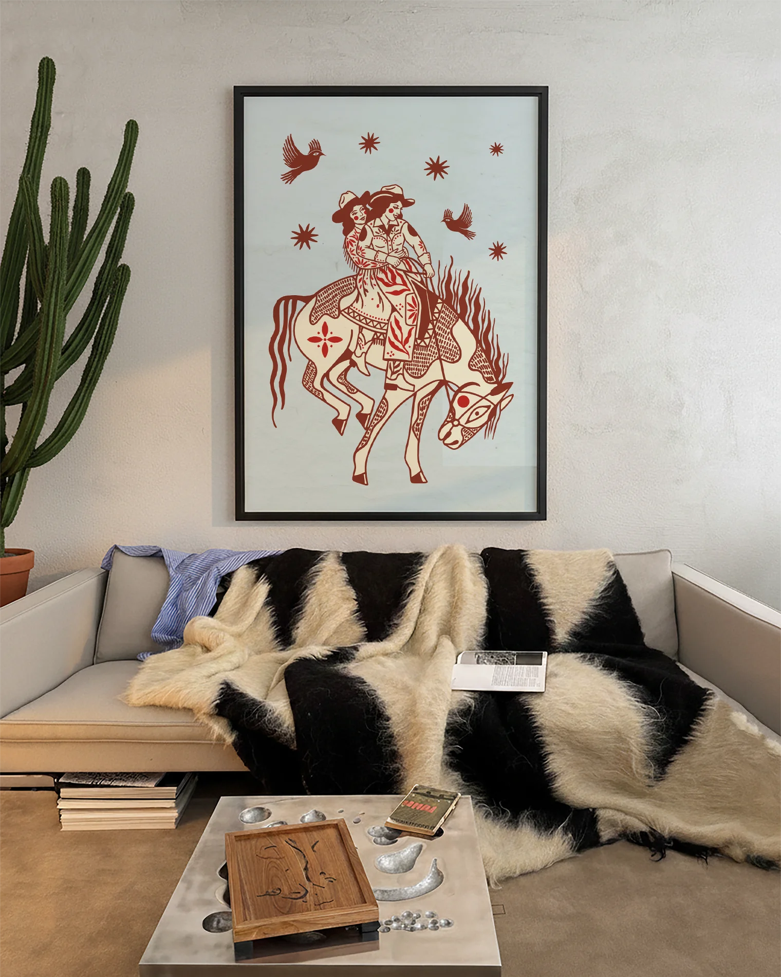 A poster with two lesbian cowgirls riding on a horse together.