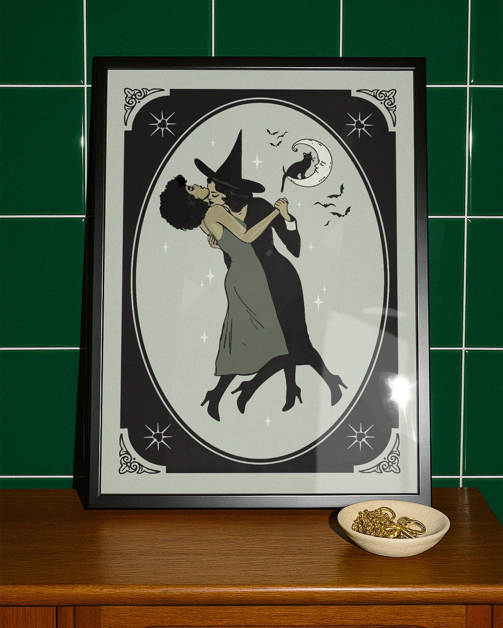 A poster with a lesbian witch couple kissing.