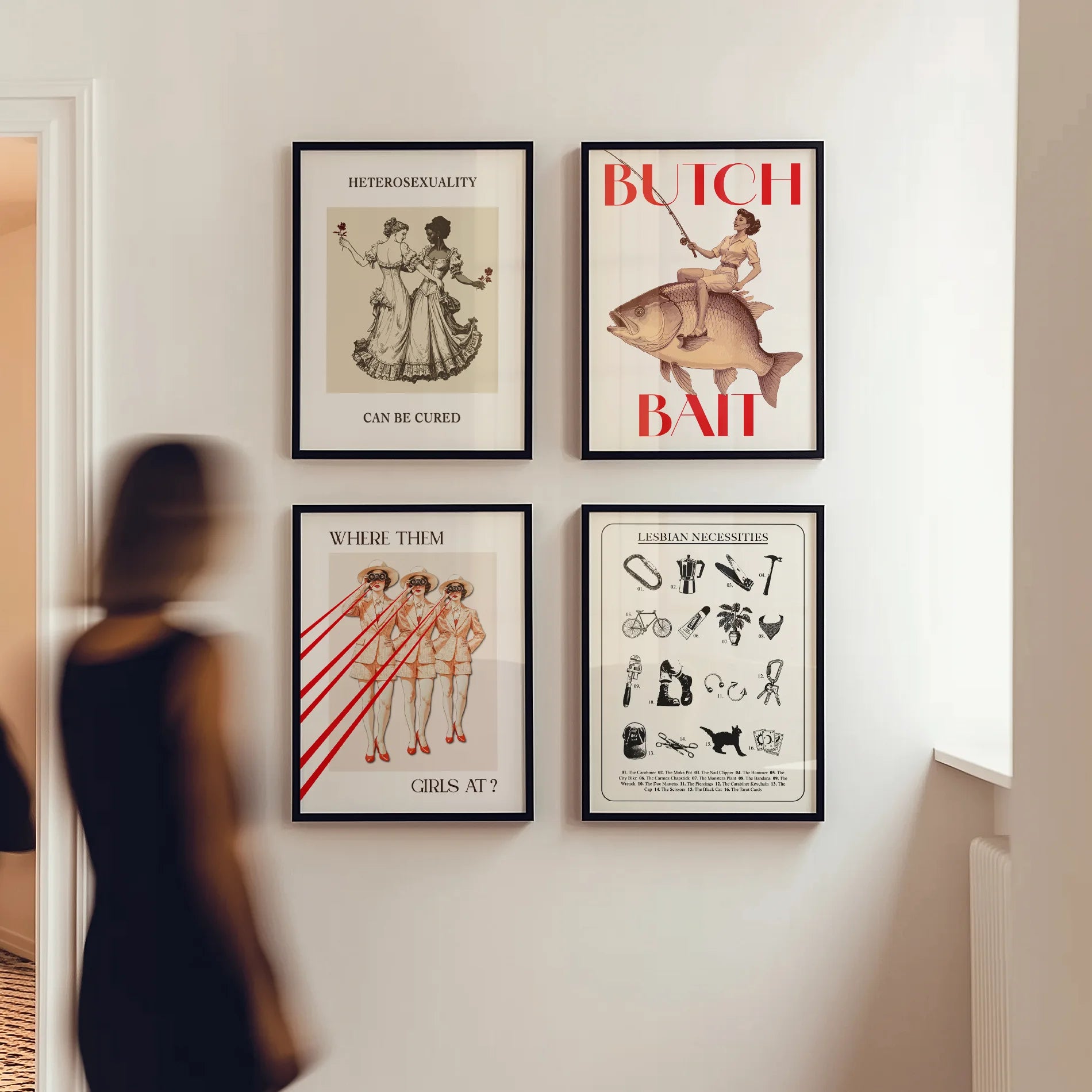 An image of four framed posters on a wall.