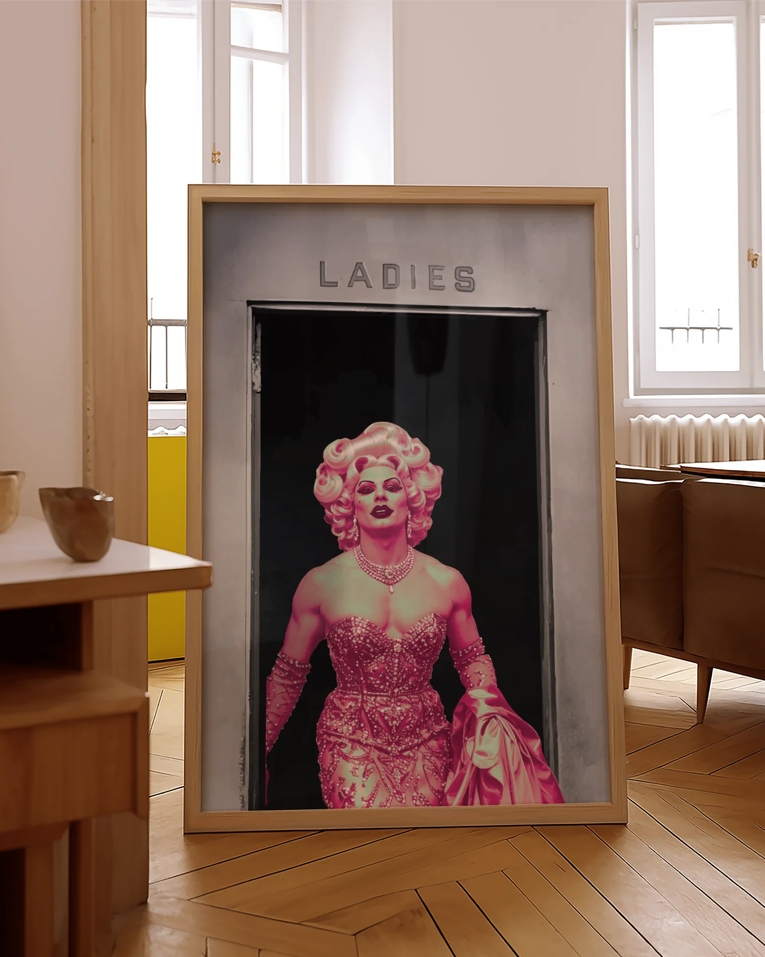 A poster with a muscular drag queen in a sparkling dress, full makeup, and wig, confidently strutting out of the ladies’ room.