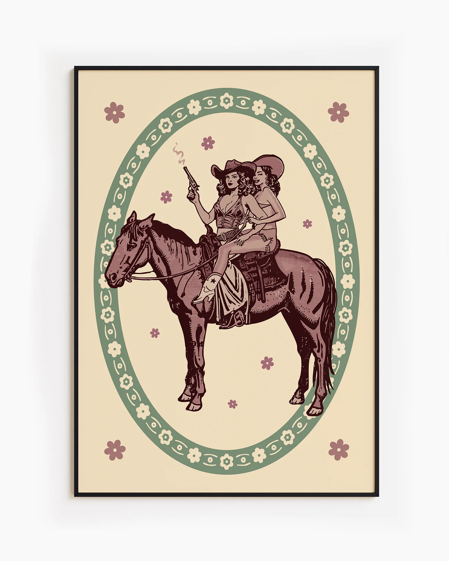 A framed poster featuring two lesbian cowgirls sitting on a horse, surrounded by a retro-style floral frame.