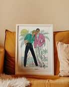 A poster depicting two gay men in a romantic embrace on a warm beach, featuring the text: “GAY GETAWAY HOLIDAY” & “Sitges, Spain 1979.”