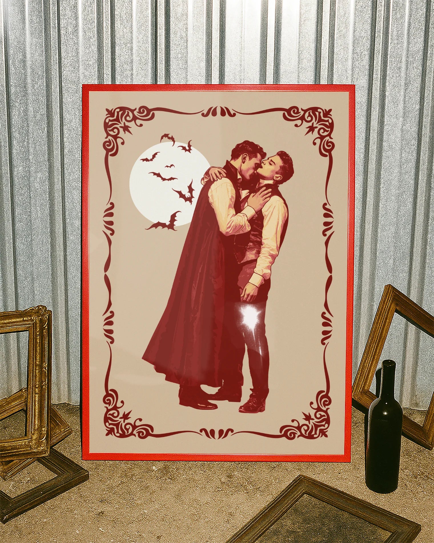 A poster featuring a male vampire kissing another man’s neck, framed by a vintage border, with a full moon and flying bats in the background.