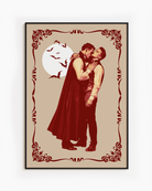 A poster featuring a male vampire kissing another man’s neck, framed by a vintage border, with a full moon and flying bats in the background.
