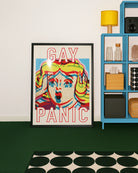 A framed poster featuring a screaming woman in pop art style with the text: *"GAY PANIC"* in red.