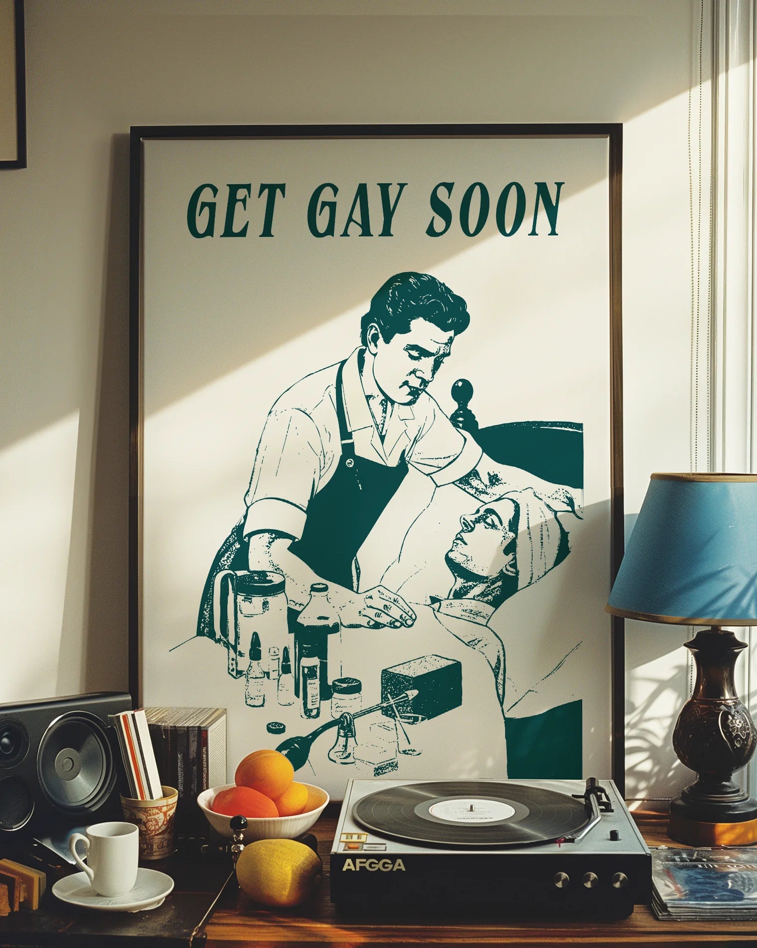 A poster depicting a male nurse taking care of a sick, bedridden man, accompanied by the ironic text: “GET GAY SOON.”