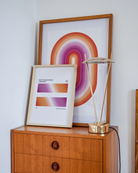 A print with two, rectangular, gradient blocks coloured with the lesbian pride flag colours, along the texts 'The Gradient Collection - Lesbian Pride'.