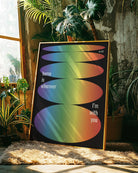 A retro inspired poster with oval forms in pride colours and text 'home is wherever I'm with you'.