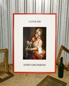 A poster showing a woman leaning against her girlfriend’s chest, both dressed in silver armor, with the text: “I LOVE MY ADHD GIRLFRIEND.”