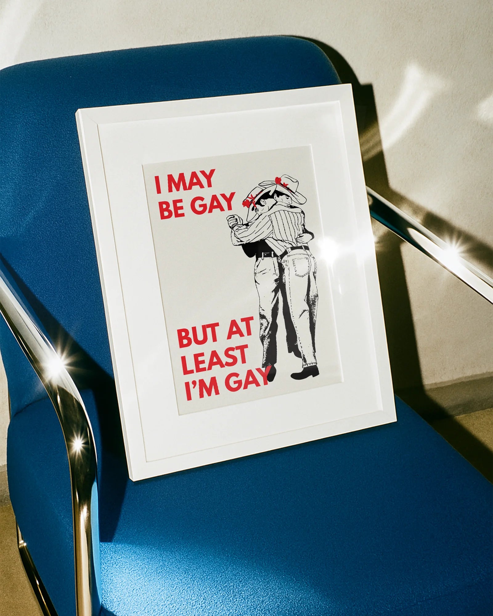 A poster with two illustrated, slow dancing cowboys with the text 'I May Be Gay But At Least I'm Gay'.