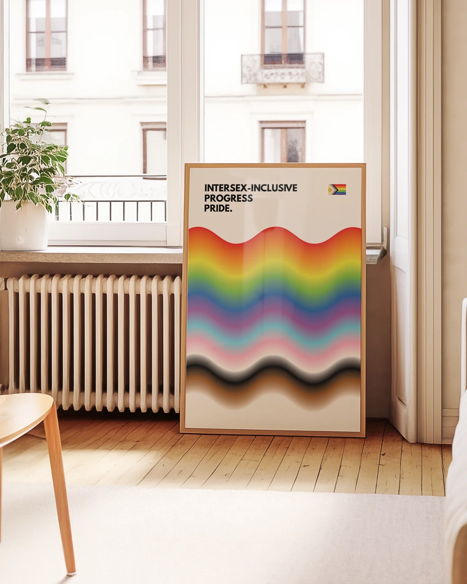 A print with the progress pride flag in a wavy, abstract form together with the text 'Intersex-Inclusive Progress Pride.'
