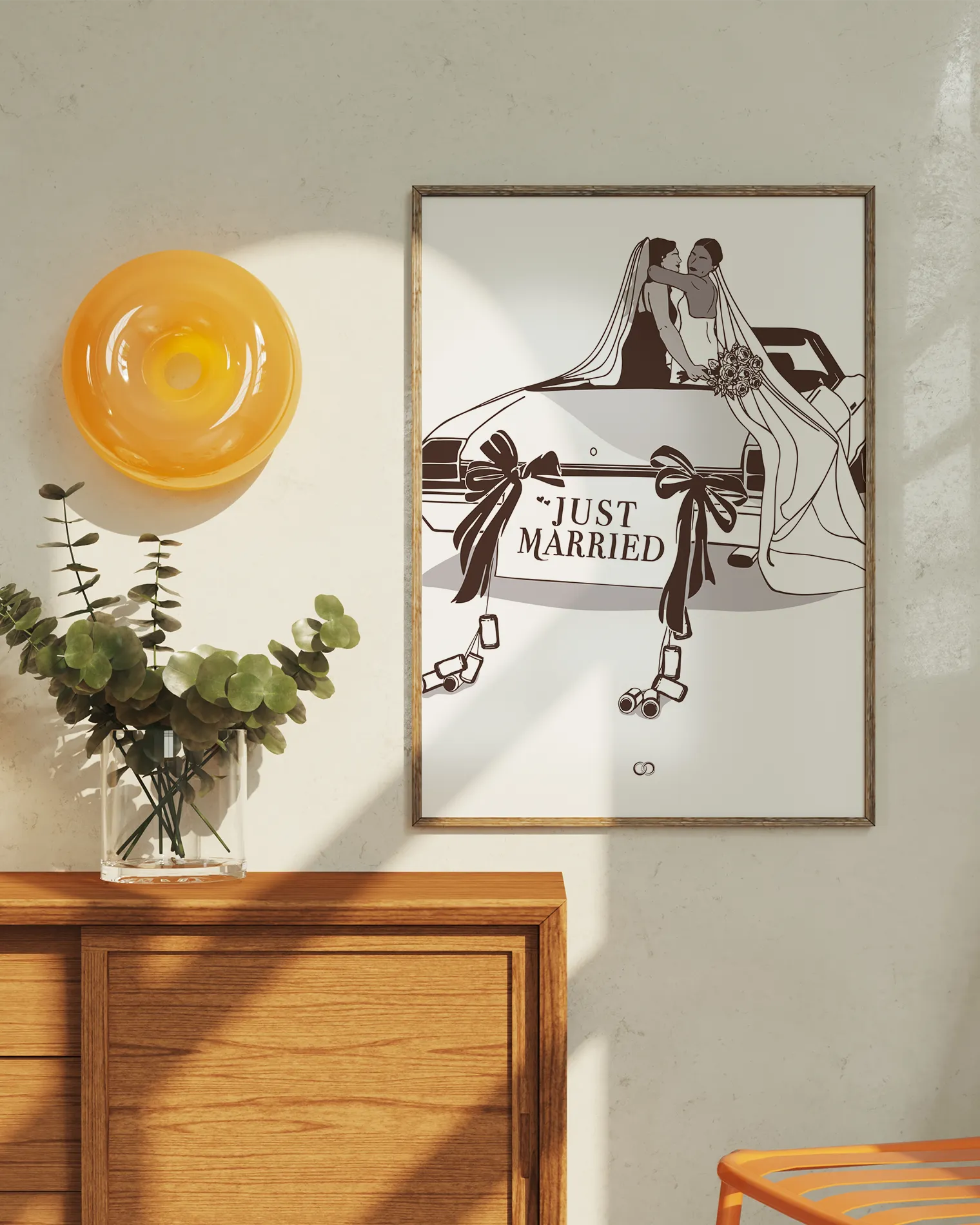 A poster with a bride couple sitting in the backseat of a car with a sign 'JUST MARRIED'.