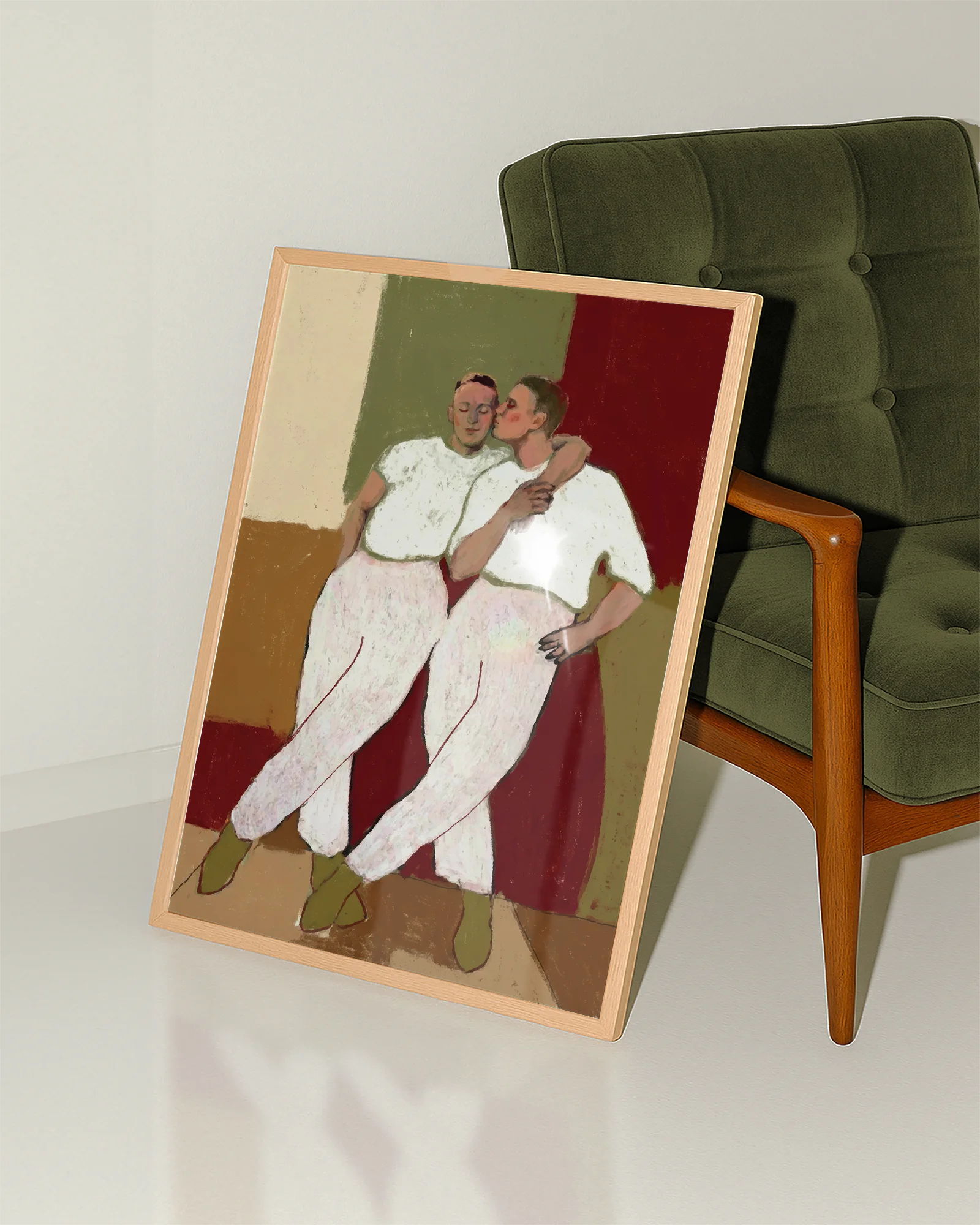 A framed poster with two gay men kissing each other on the cheek, abstract style.