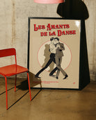 A vintage poster with two illustrated gay men dancing, with the text 'Les Amants De La Danse'.