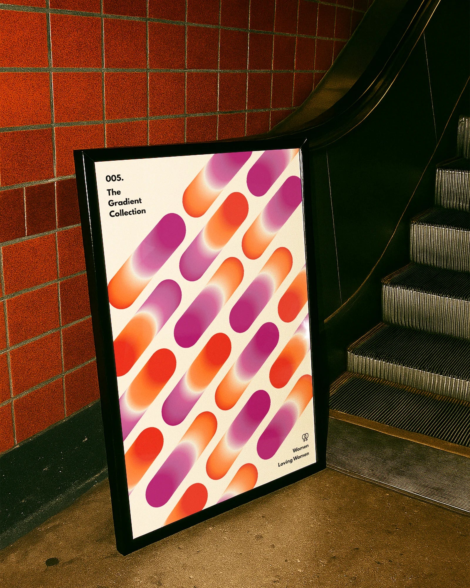 A print with rectangular, gradient shapes in a line, coloured with the lesbian pride flag colours, along the texts '005. The Gradient Collection' and 'Women Love Women'.