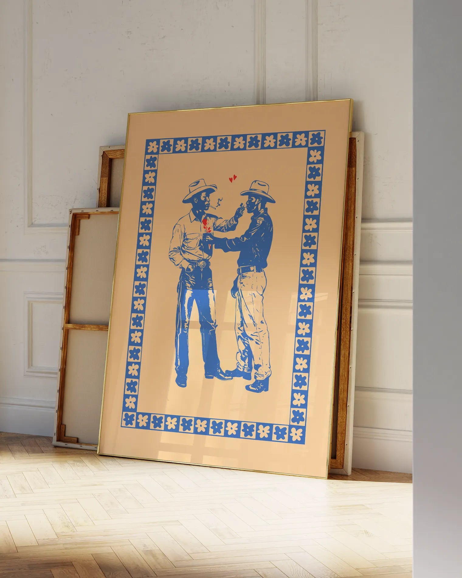 A print with two illustrated cowboys in love, against a beige background.