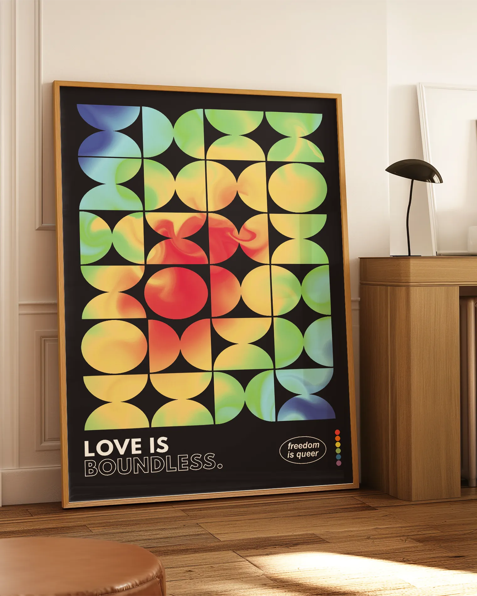A print with the classic pride flag colours in abstract, rounded forms with the text 'Love Is Boundless.'