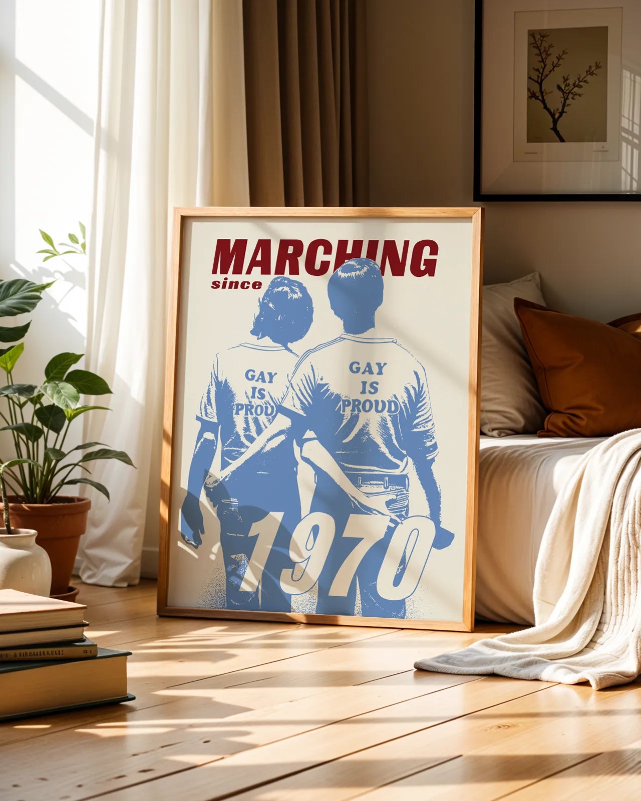 A framed print with an illustrated gay couple walking the first pride parade in New York 1970.