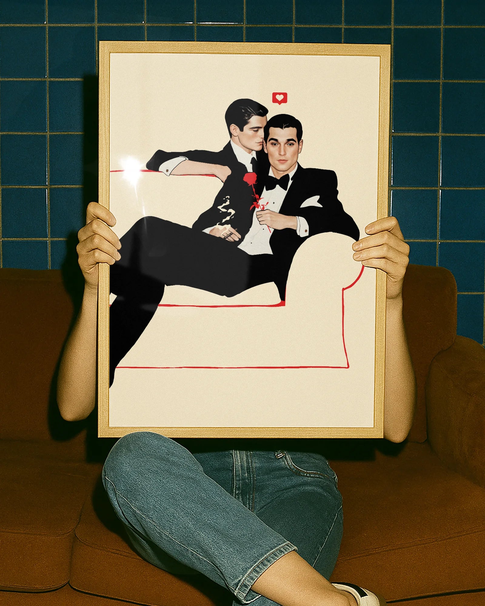 A poster with two fine looking gentleman in suits, cuddling on a couch. Vintage, 60's and elegant style.