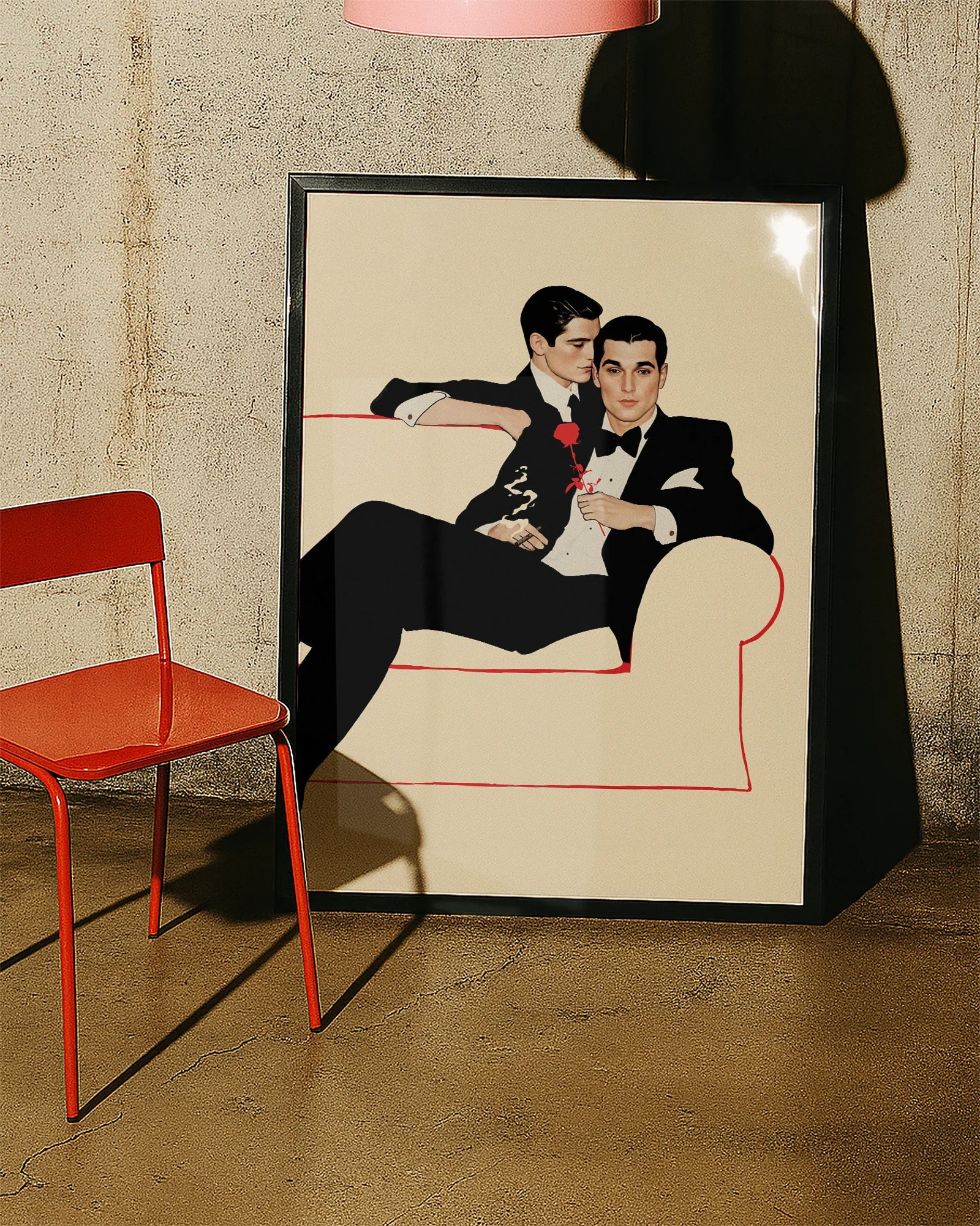 A poster with two fine looking gentleman in suits, cuddling on a couch. Vintage, 60's and elegant style.