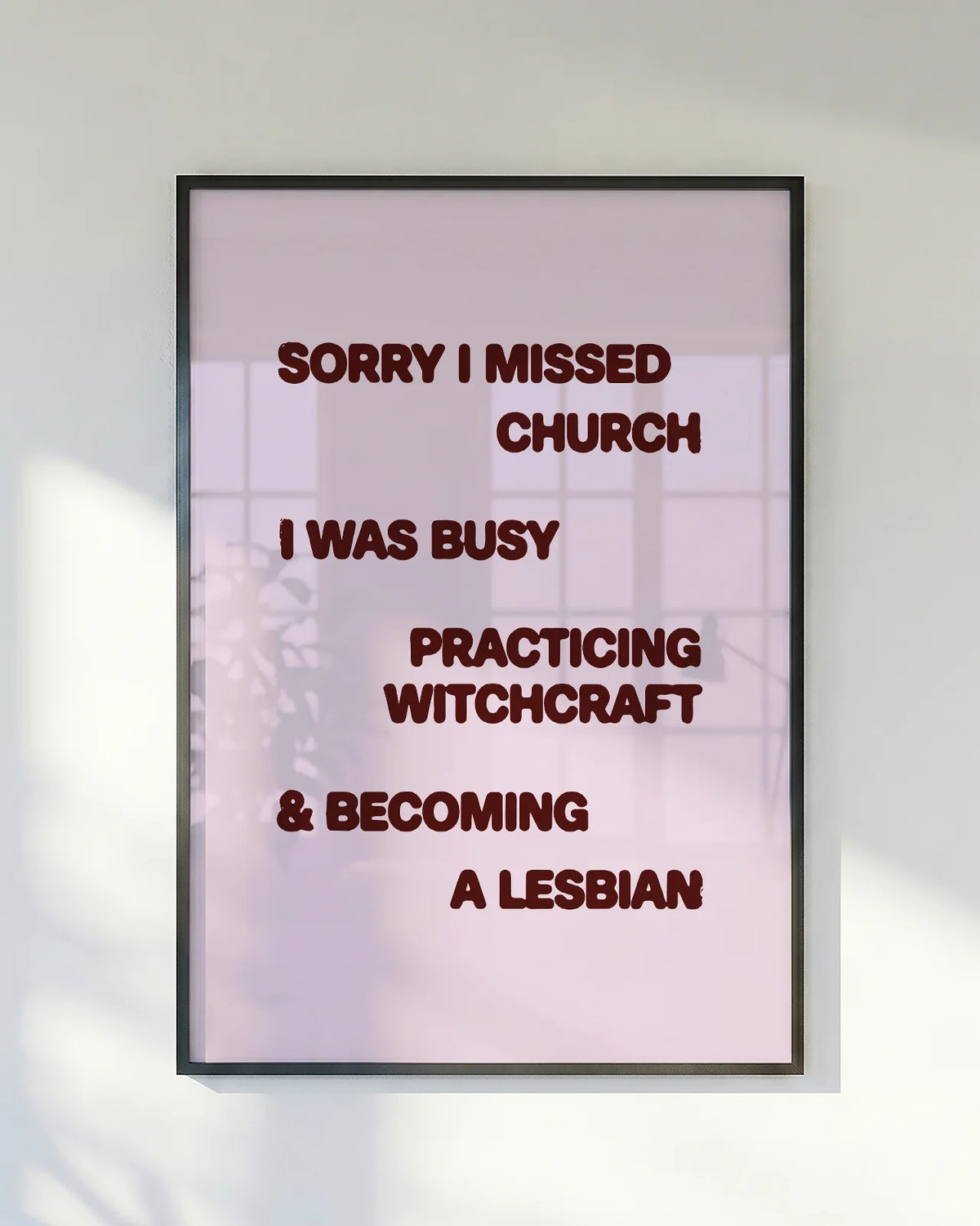 A poster with the text "Sorry I missed church, I was busy practicing witchcraft & becoming a lesbian".