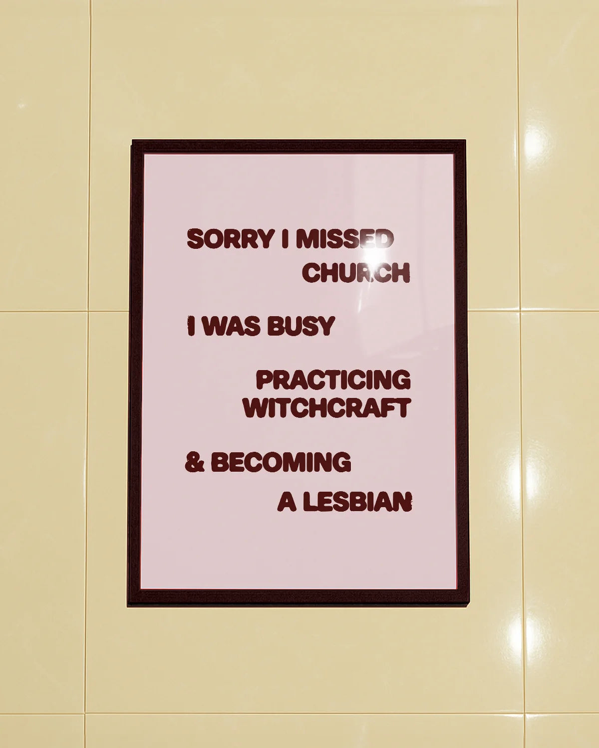 A poster with the text "Sorry I missed church, I was busy practicing witchcraft & becoming a lesbian".