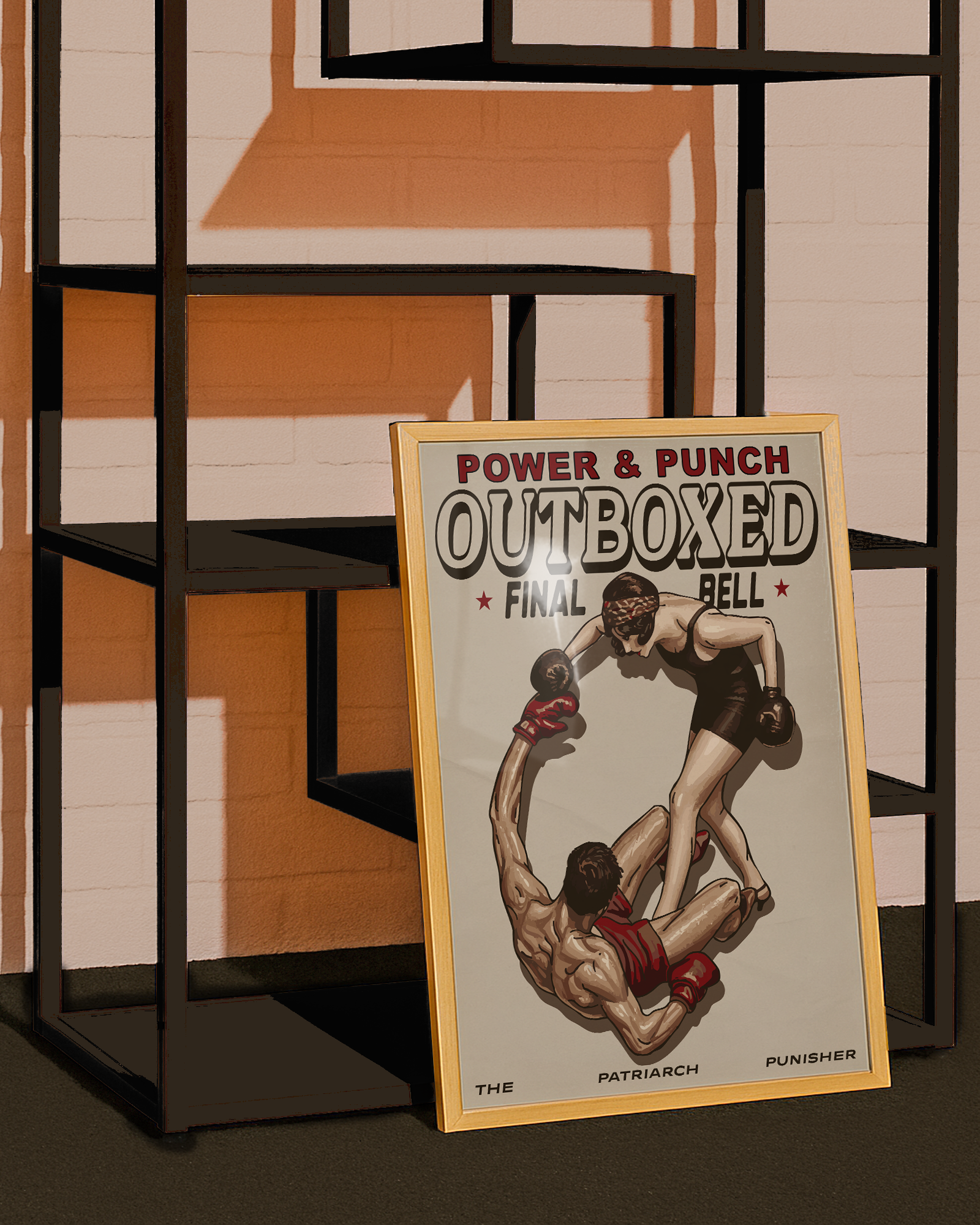 A framed poster featuring a female boxer completely dominating the ring, knocking down her male opponent, with the texts: “POWER & PUNCH”, “OUTBOXED”, “FINAL”, and “THE PATRIARCH PUNISHER.”