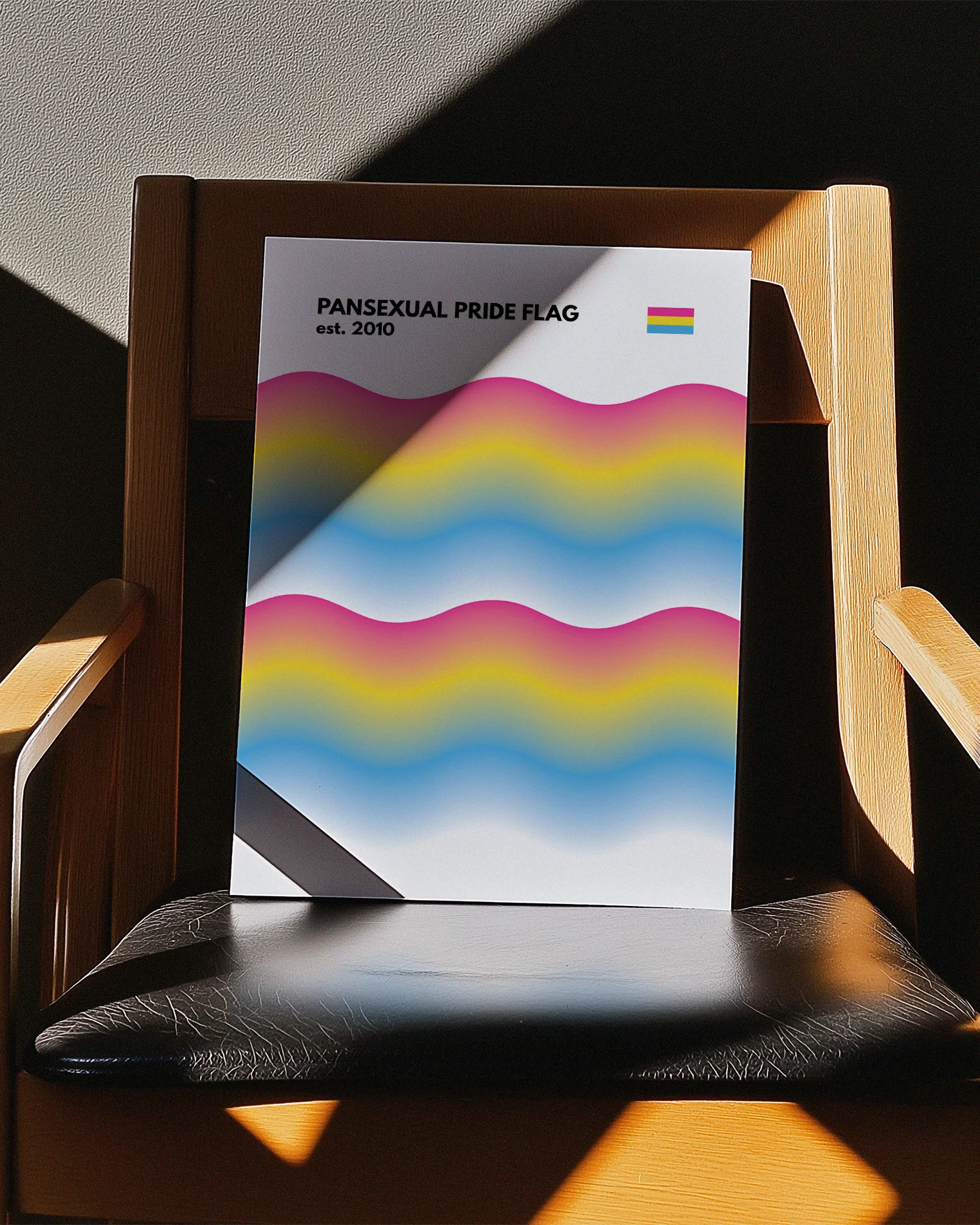 A print with the pansexual pride flag in a wavy, abstract form together with the text 'Pansexual Pride Flag est. 2010.'