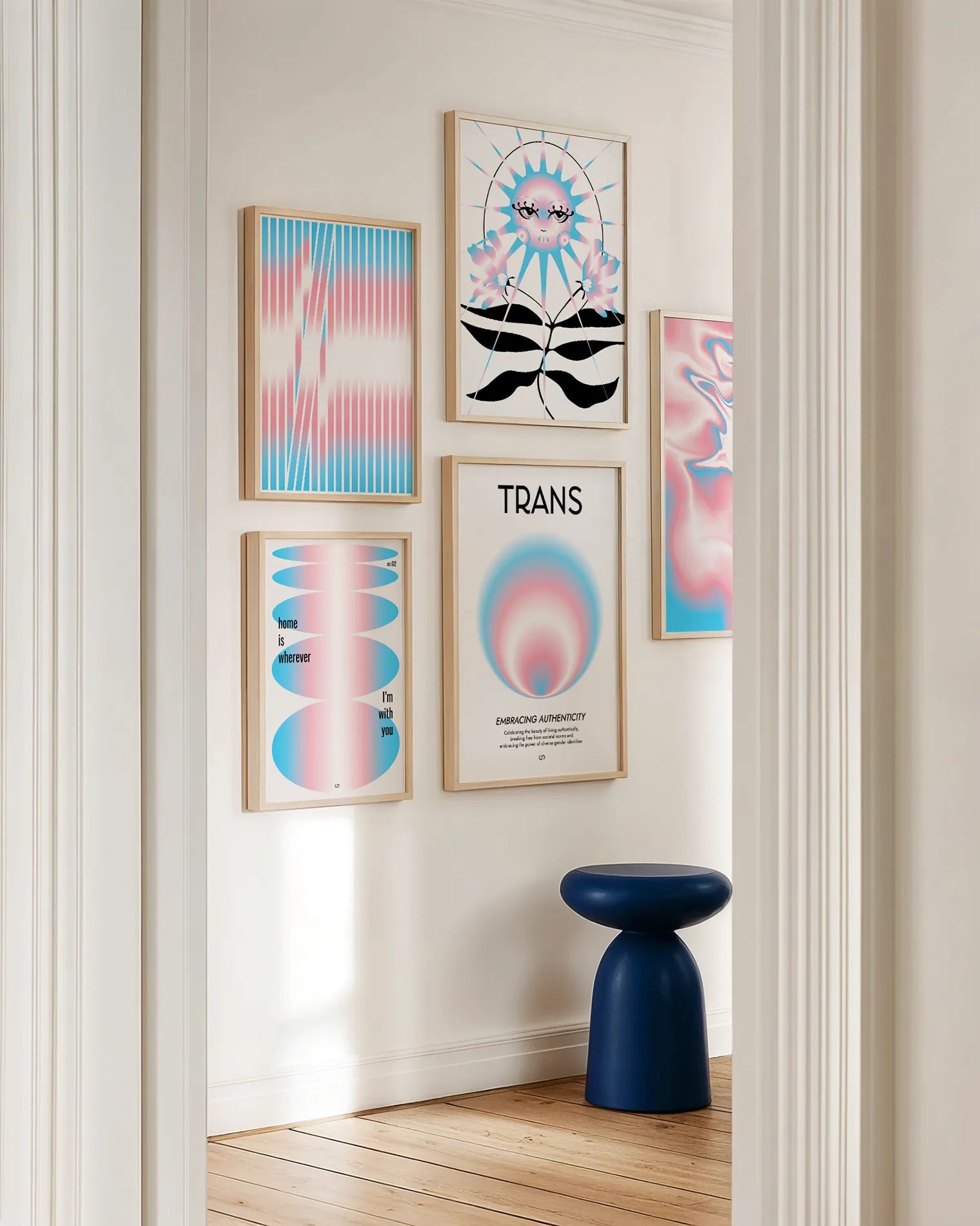 A wall with five prints in abstract trans colours.