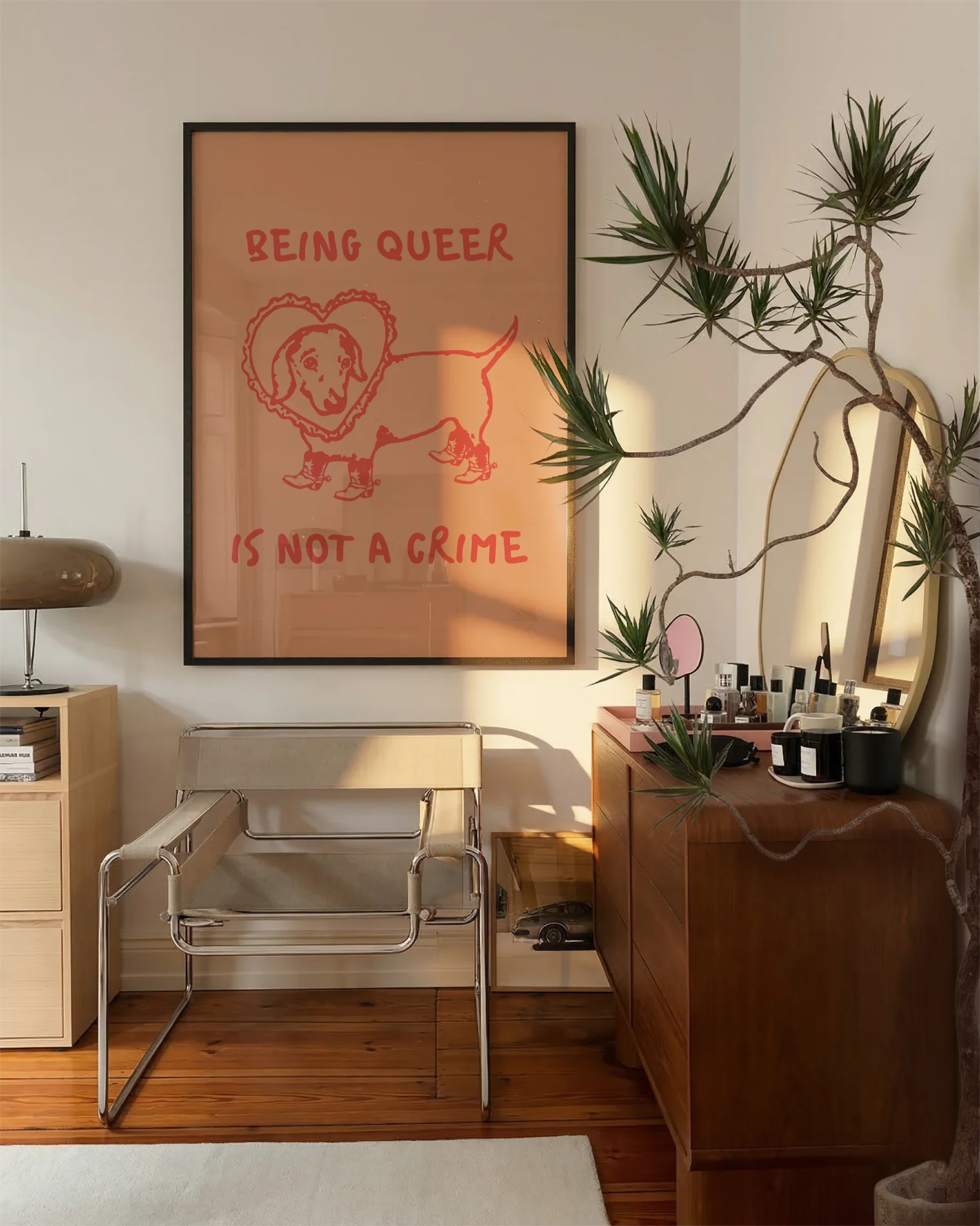 A poster with an illustrated dog, with the text 'BEING QUEER IS NOT A CRIME".