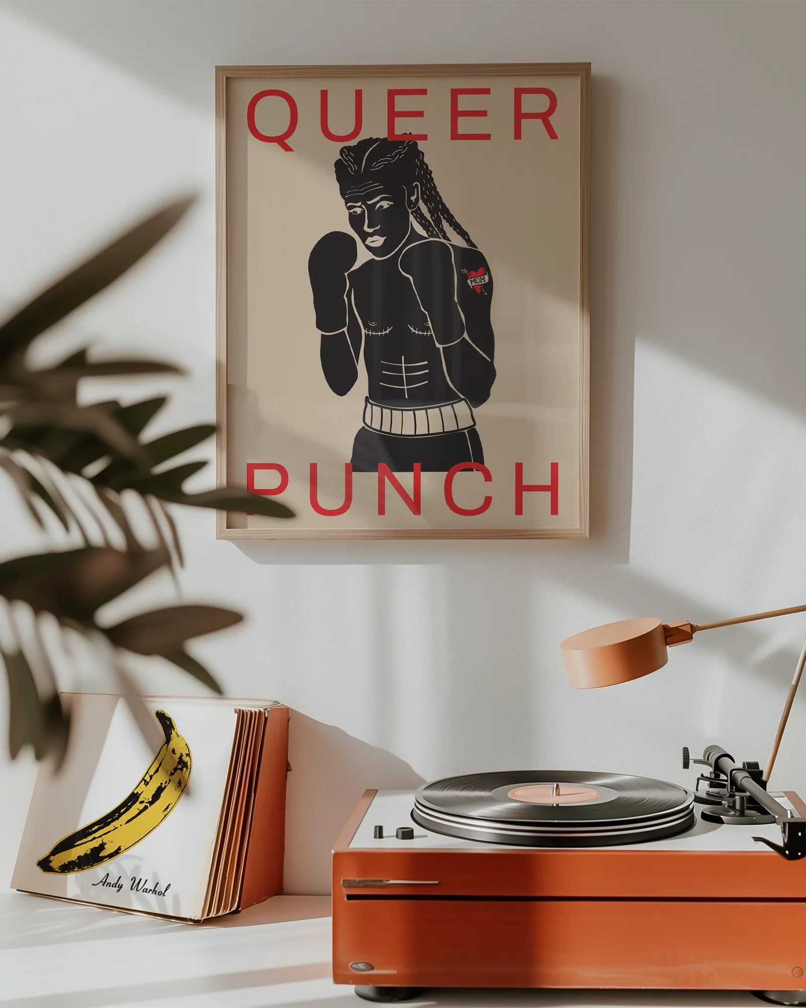 A poster featuring a queer person with a bare chest and boxing gloves, alongside the text: "QUEER PUNCH."