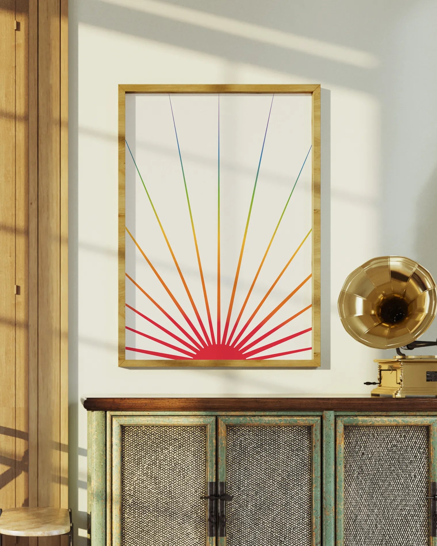 A print with an illustrated sun in pride colours agains a beige background.