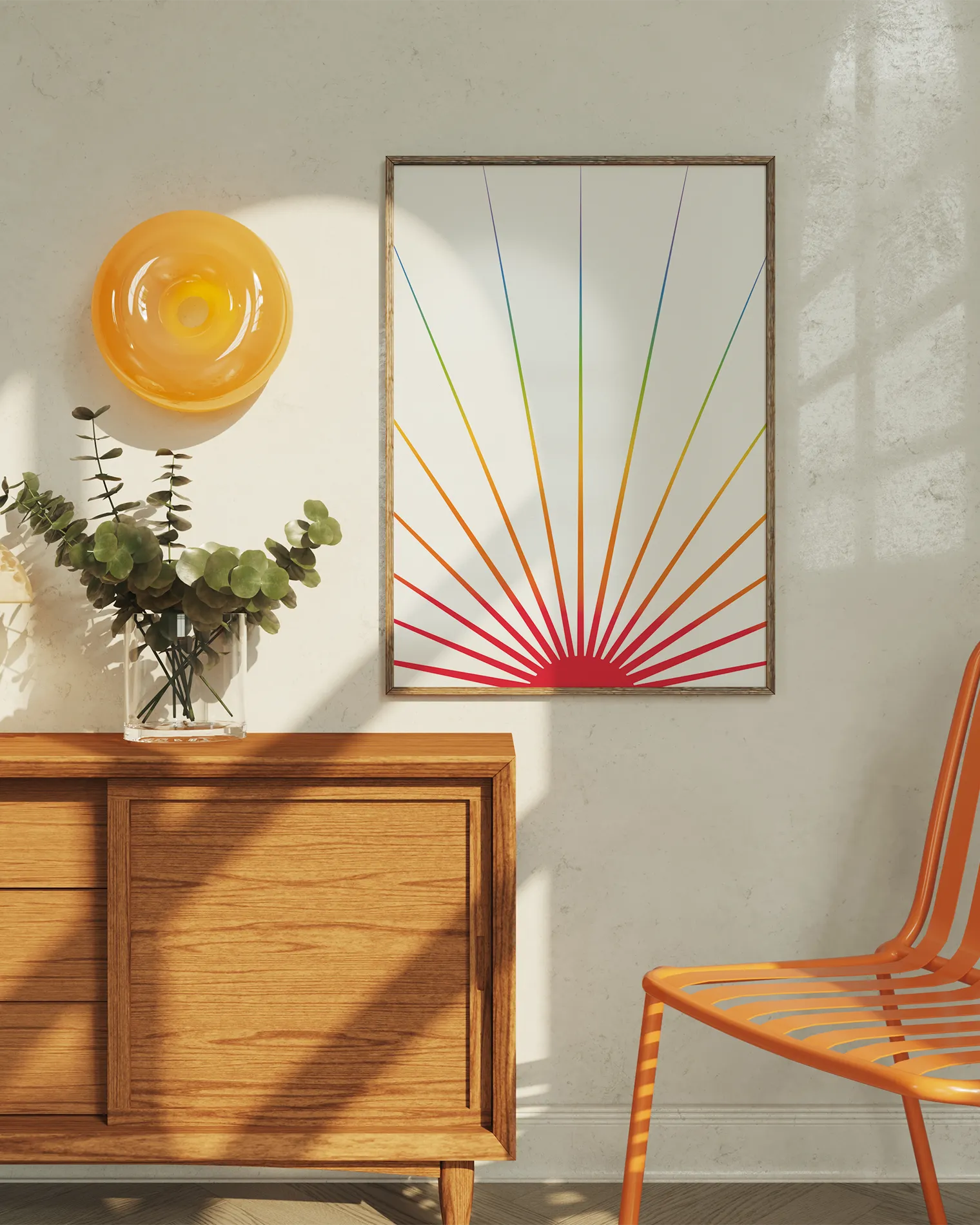 A print with an illustrated sun in pride colours agains a beige background.
