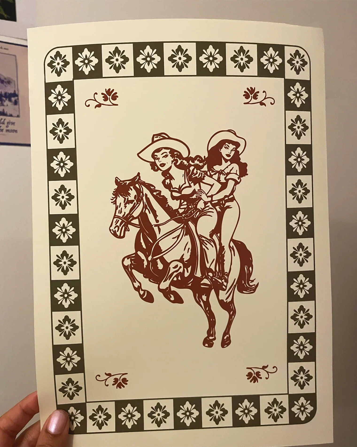 A review image from customer holding a poster.