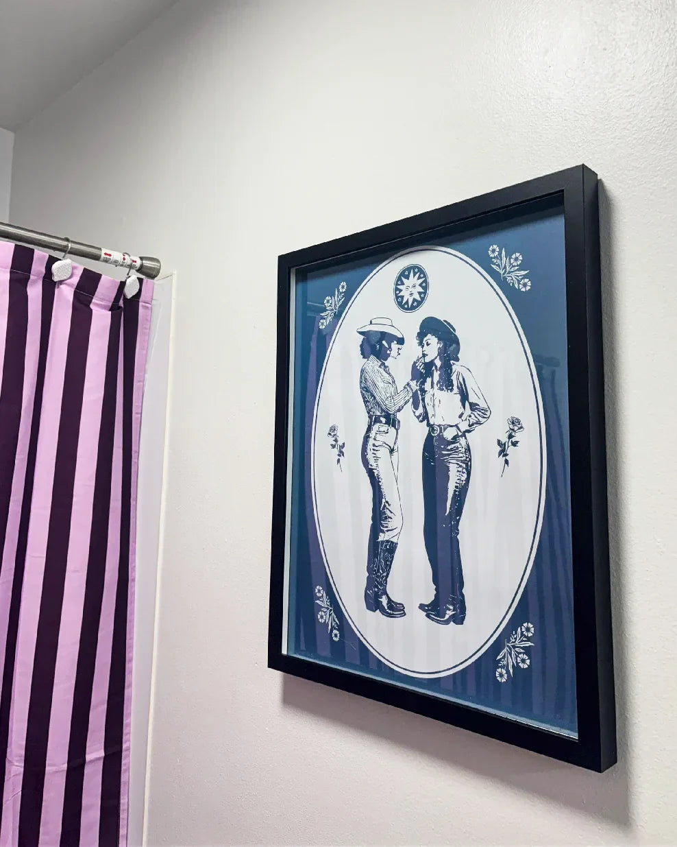 A review photo from a customer with a framed print.