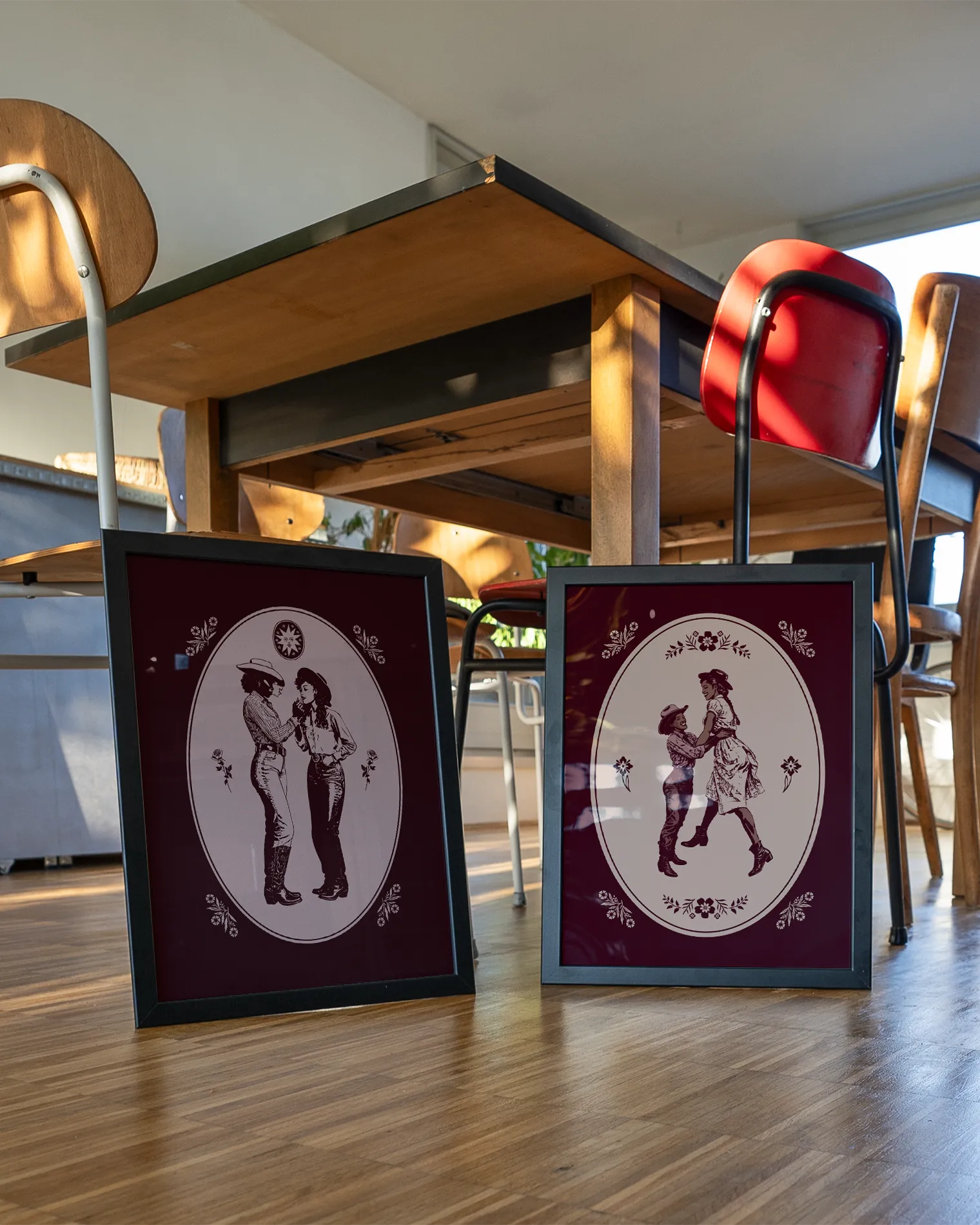 A print with two illustrated lesbian cowgirls in a loving, playful pose.