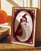 A poster with two lesbian witches kissing.