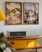 The poster features two sapphic ladies in an oil painting style, set in the Victorian era, surrounded by a detailed white frame.