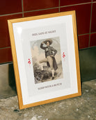 A poster featuring a charming butch dyke in a suit and hat, with the text 'FEEL SAFE AT NIGHT, SLEEP WITH A BUTCH'.