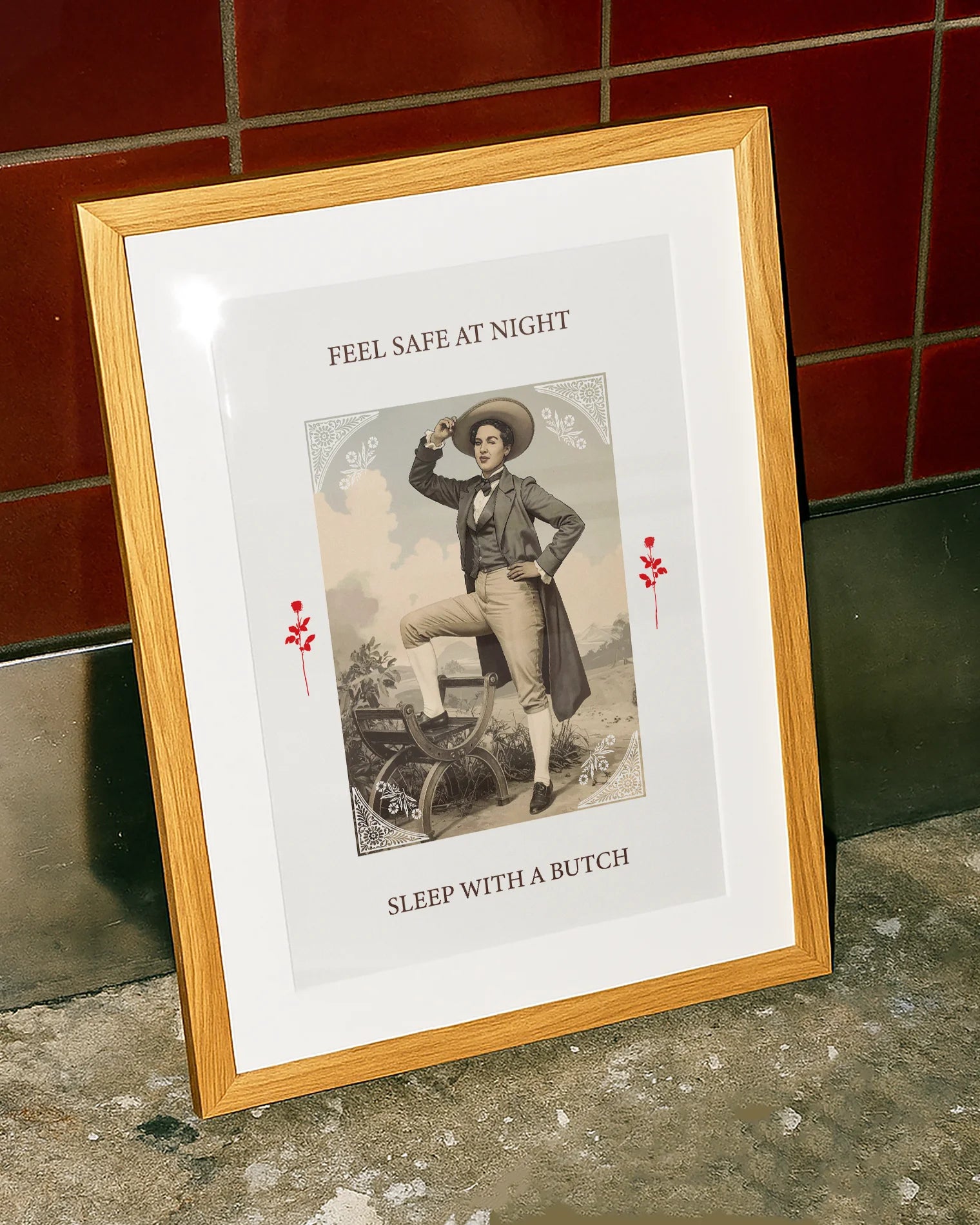 A poster featuring a charming butch dyke in a suit and hat, with the text 'FEEL SAFE AT NIGHT, SLEEP WITH A BUTCH'.