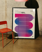 A print with the bisexual pride flag in a smooth, curvy and abstract shape.