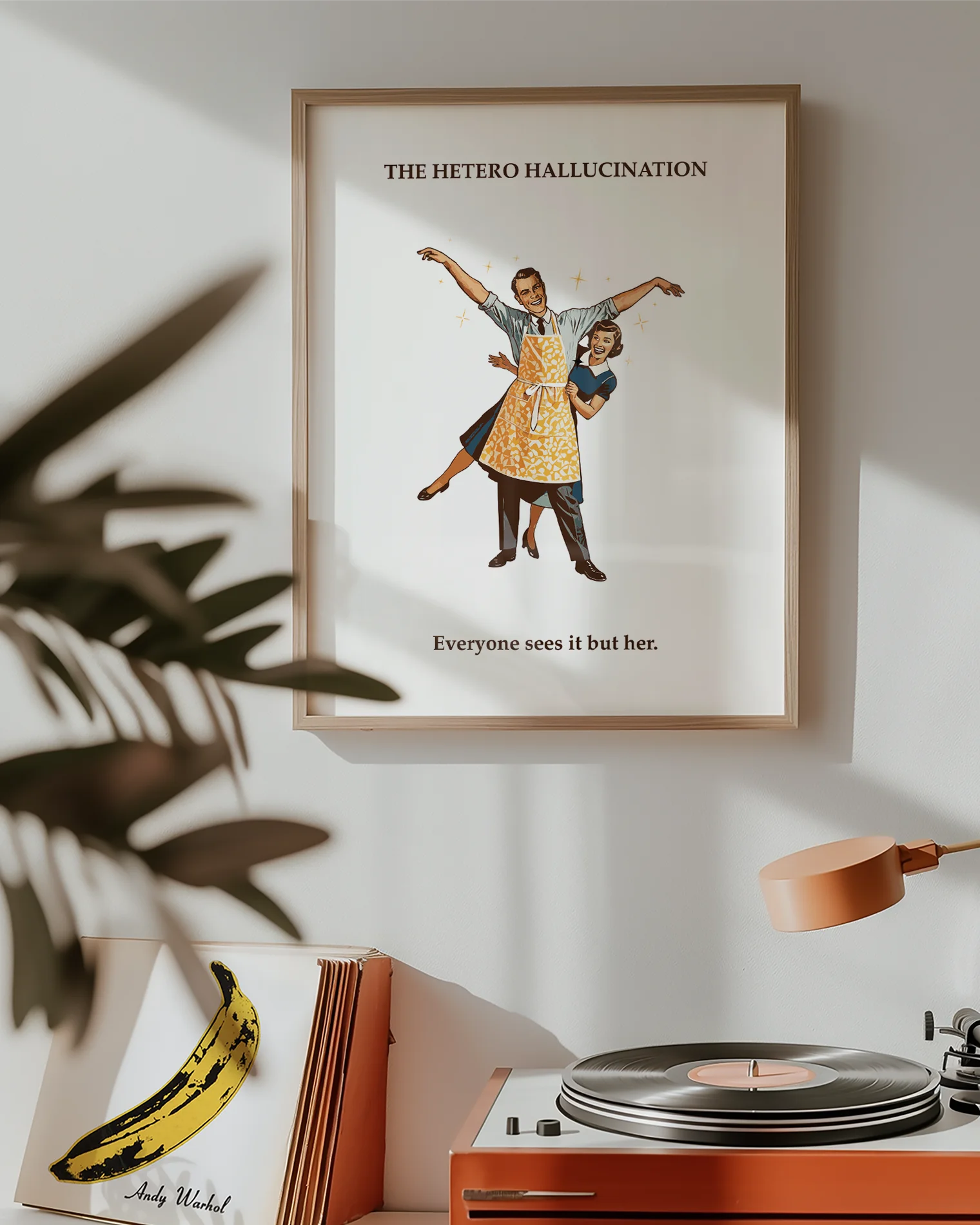 A poster featuring a joyful wife next to her unmistakably flamboyant husband, paired with the text: “Hetero Hallucination – Everyone sees it but her.”