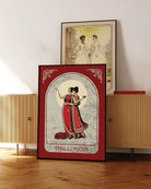 A poster with an illustrated, sapphic couple in the 1700's, posing in red dresses with the text 'The Lovers'.