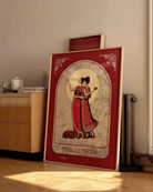 A poster with an illustrated, sapphic couple in the 1700's, posing in red dresses with the text 'The Lovers'.