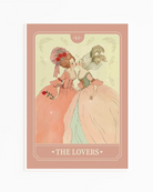 A print with a sapphic couple kissing in a tarot-style, 1700's era, with the text 'The Lovers'.