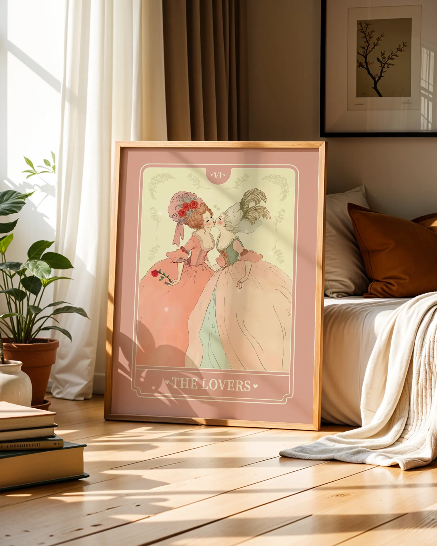 A print with a sapphic couple kissing in a tarot-style, 1700's era, with the text 'The Lovers'.