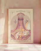 A print with a sapphic couple in a bedroom, Rococo illustrated style.