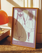 A print with an illustrated couple holding hands, with additional text about WLW - women who love women.